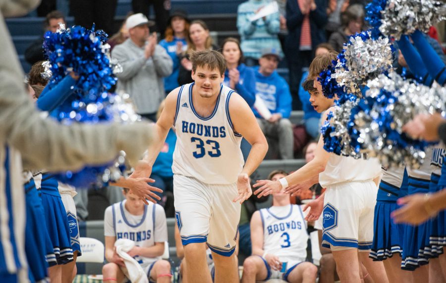 Pullman center Austin Hunt makes his entrance before the 2A district championship basketball game on Thursday, Feb. 16, 2023, in Pullman, Wash. 