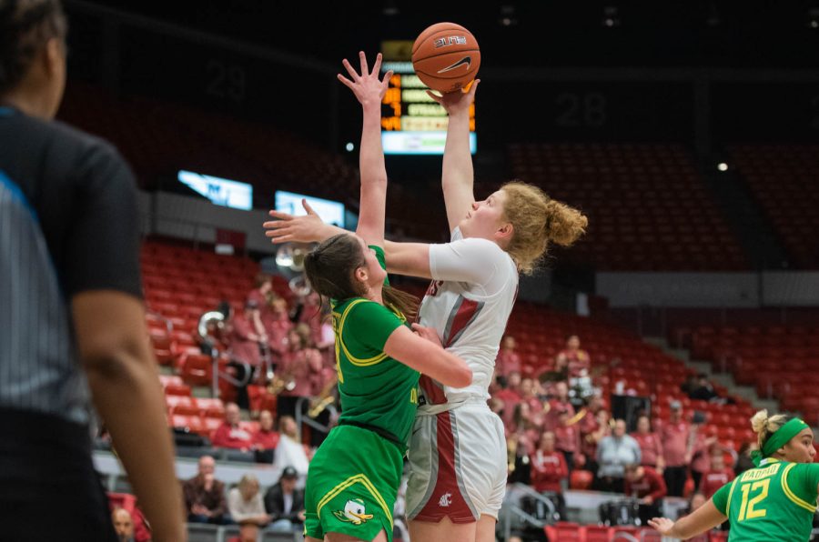 WSU center Jessica Clarke goes up for a shot in the paint during an NCAA women’s basketball game against Oregon, Friday, Feb. 17, 2023, in Pullman, Wash. 
