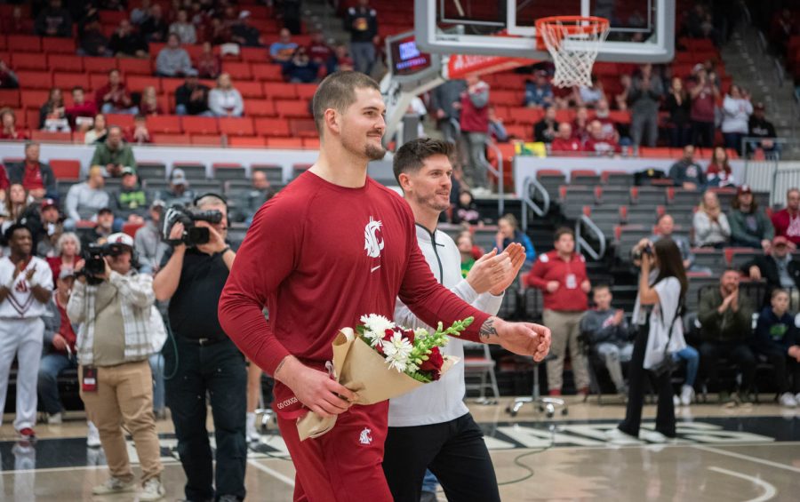 WSU center Jack Wilson walks out to celebrate senior night before an NCAA men’s basketball game against Oregon, Sunday, Feb. 19, 2023, in Pullman, Wash.