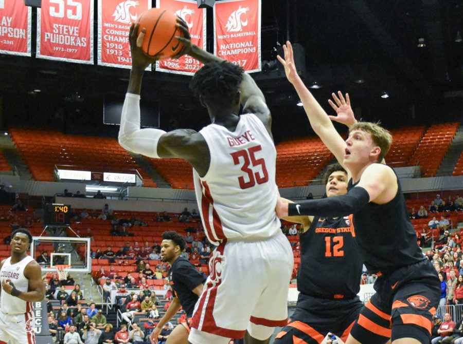 WSU forward Mouhamed Gueye looks for a pass during an NCAA men’s basketball game against Oregon State, Thursday, Feb.16, 2023, Pullman, Wash. 