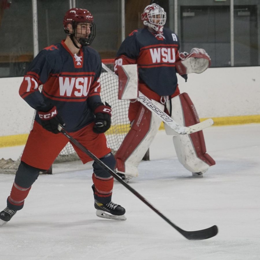 Defenseman Adam Beamish and Goalie Kane Paxton during WSU’s 4–2 victory over USC to secure a playoff spot on Jan. 21, 2023, in Anaheim, Calif.
