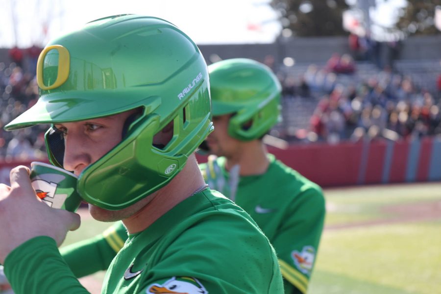 An+Oregon+Duck+takes+a+water+break+during+his+teams+14-8+win+over+WSU+during+an+NCAA+baseball+game+March+18%2C+2023+at+Bailey-Brayton+Field.