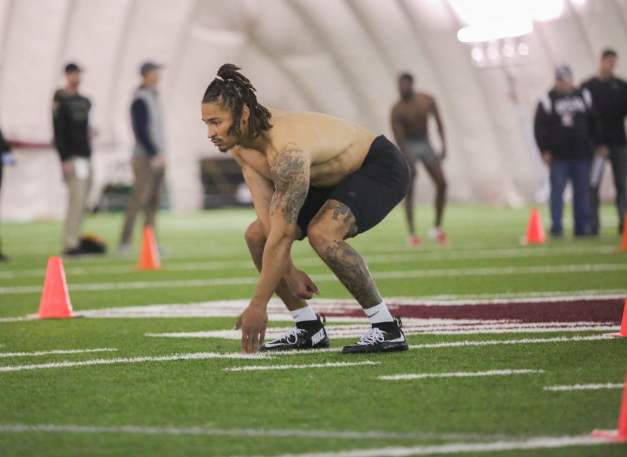 WSU football player Armani Marsh gets set during one of the Pro Day drills, Tuesday, March 28, 2023, in Pullman, Wash.