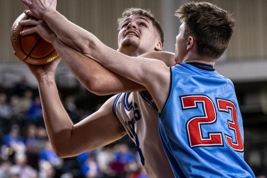 Pullman center Austin Hunt drives to the hoop during a 2A state semifinal game against Mark Morris, March 3, 2023, in Yakima, Wash.