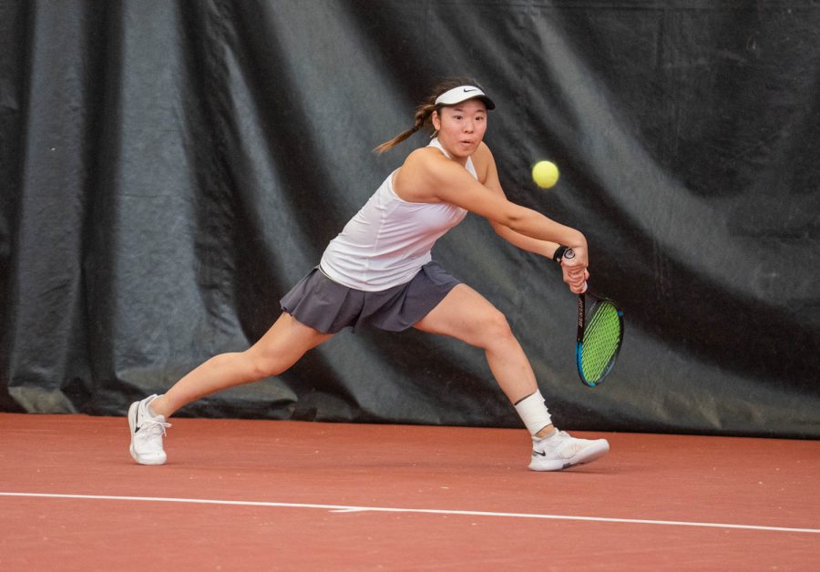 WSU tennis player Yura Nakagawa goes to hit the ball during an NCAA tennis match against UCLA, Sunday, March 5, 2023, in Pullman, Wash. 