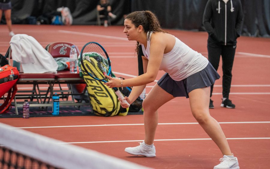 WSU tennis player Hania Abouelsaad waits for a serve during an NCAA tennis match against UCLA, Sunday, March 5, 2023, in Pullman, Wash. 