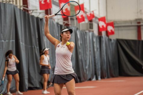 WSU tennis player Yura Nakagawa gets ready to serve the ball during an NCAA tennis match against UCLA, Sunday, March 5, 2023, in Pullman, Wash. 