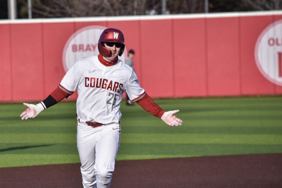 WSU first baseman Sam Brown celebrates after hitting a home-run during an NCAA game against Seattle University, Tuesday, March 7, 2023, in Pullman, Wash.