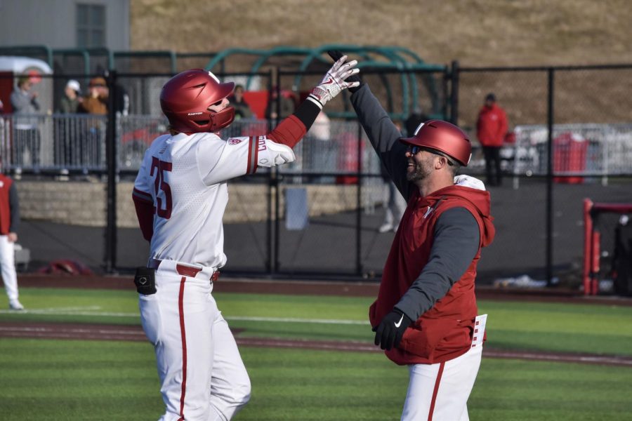 WSU+first+baseman+Sam+Brown+celebrates+with+Brian+Green+after+hitting+a+home-run+with+during+an+NCAA+game+against+Seattle+University%2C+Tuesday%2C+March+7%2C+2023%2C+in+Pullman%2C+Wash.