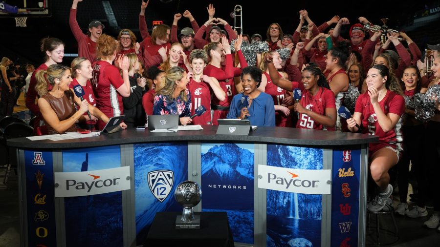 WSU womens basketball, the Crimson Girls and the WSU pep band crash the set of the Pac-12 Network for an interview as the Cougs clinch their ticket to their first Pac-12 Championship game March 3, 2023 in Las Vegas.