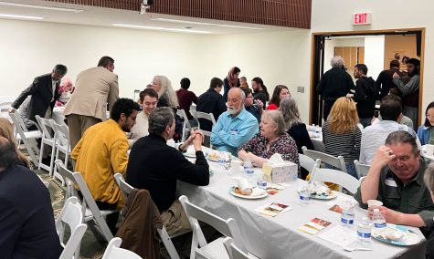 Attendees breaking fast together, April 8.