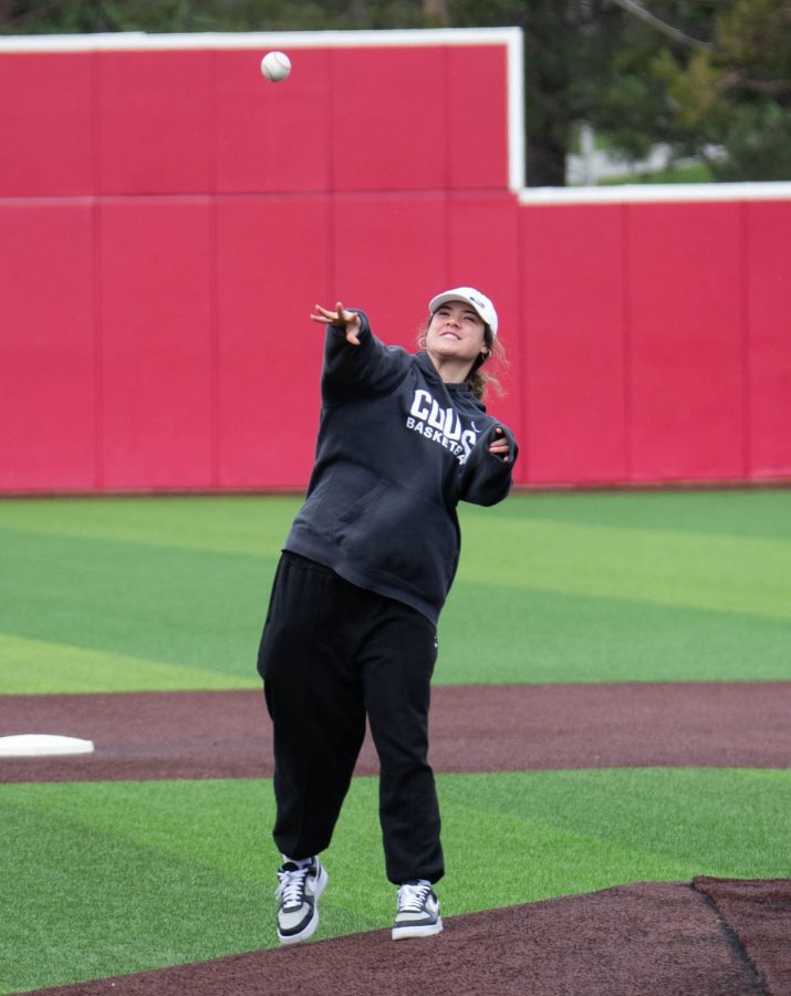WSU women’s basketball player Charlisse Leger-Walker throws the opening pitch before an NCAA baseball game against Santa Clara, Friday, April 21, 2023, in Pullman, Wash.