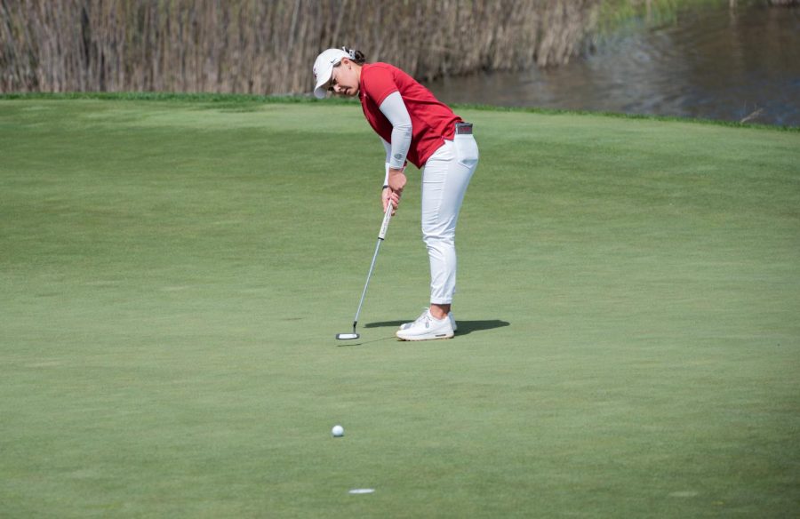 Darcy Habgood watches as her putt nears the hole, May 8.