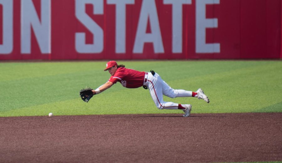 Kyle Russell dives for a ball against the Stanford Cardinal, May 19.