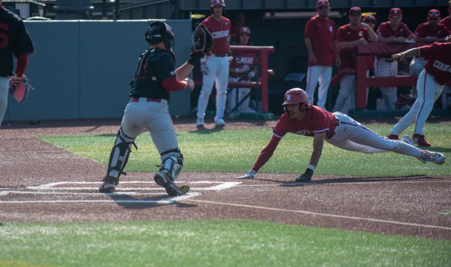 Bryce Matthews dives towards home in attempt to score against Stanford, May 19.