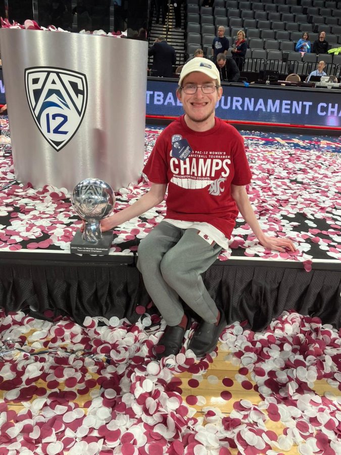 Brenden Potts poses with the Pac-12 Championship trophy March 5, 2023 at Michelob Ultra Arena in Las Vegas.