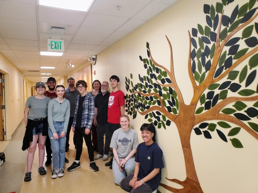 Group photo at Pullman Regional Hospital in front of the Tree of Remembrance mural, Saturday, April 29, 2023.