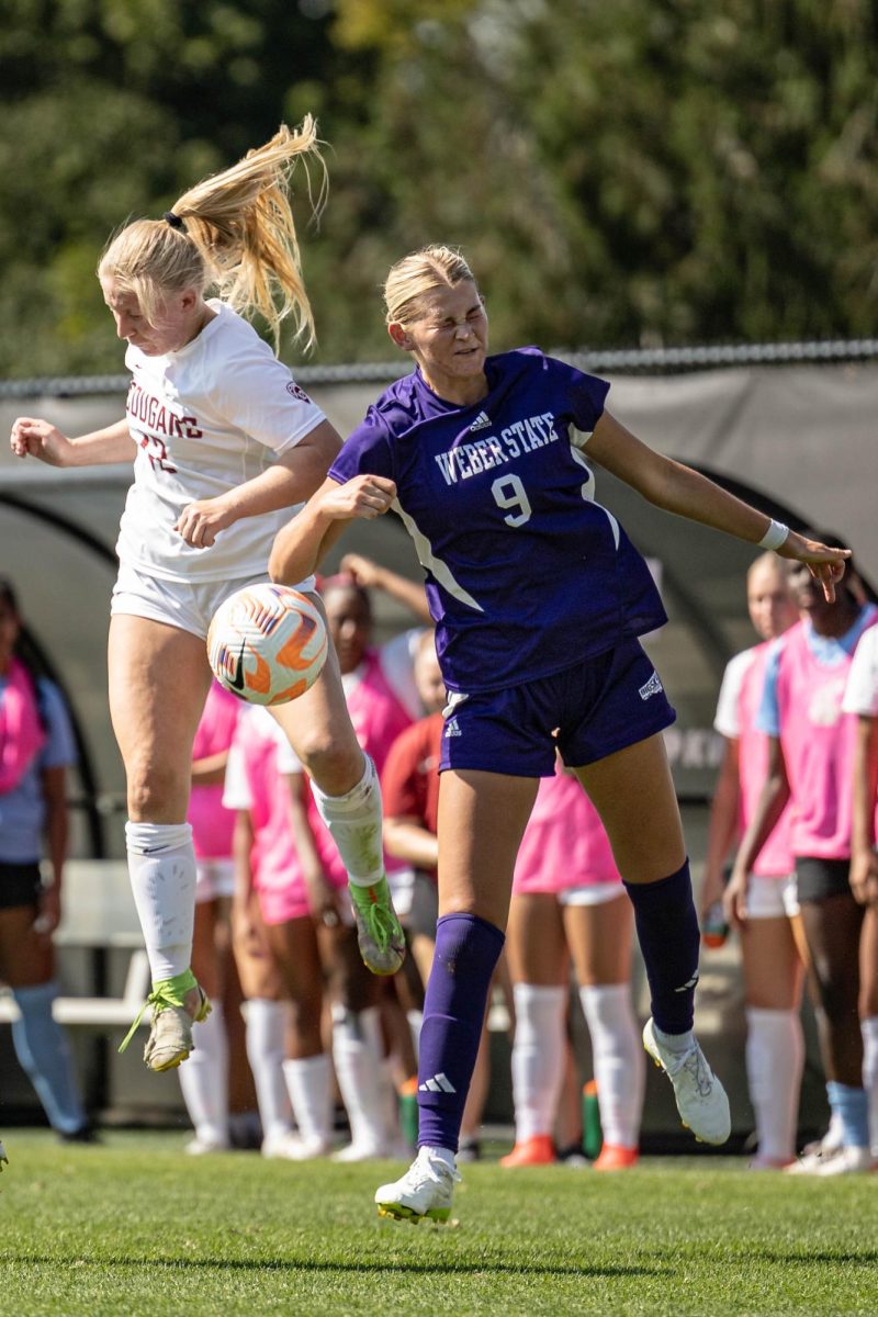 WSU midfielder Megan Santa Cruz dribbles through Weber State’s defense during an NCAA soccer game, Aug. 27, 2023, in Pullman, Wash.