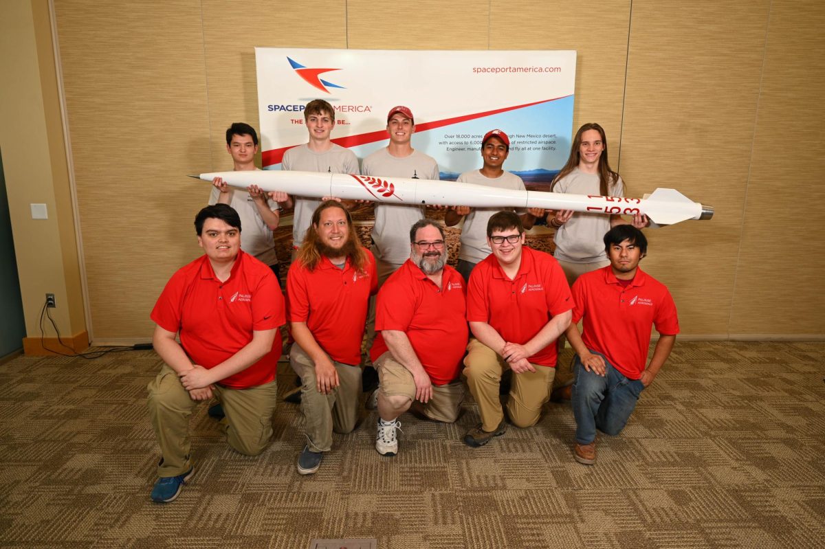 Palouse+Aerospace+with+their+build+posing+for+a+group+portrait+at+the+2023+Spaceport+America+Cup.