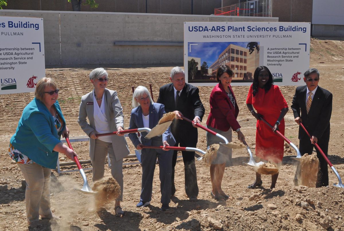 Wendy Powers, Elizabeth Chilton, Patty Murray, Tom Vilsack, Cathy McMorris Rodgers, Chavonda Jacobs-Young and Simon Liu breaking ground at the ceremony on Aug. 1, at the building site of the new Plant Sciences Building.