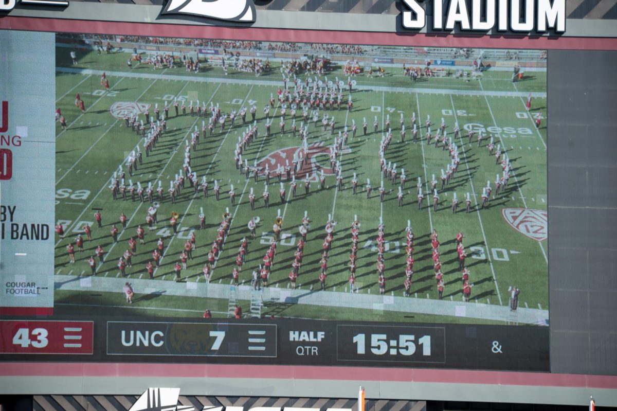 The WSU marching bands spells out 100 on the field during halftime, Sept. 16. 