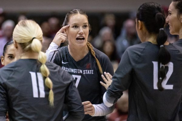 WSU Pia Timmer talks with her teammates during an NCAA volleyball match against Tulsa, Sept. 2, 2023, in Pullman, Wash.