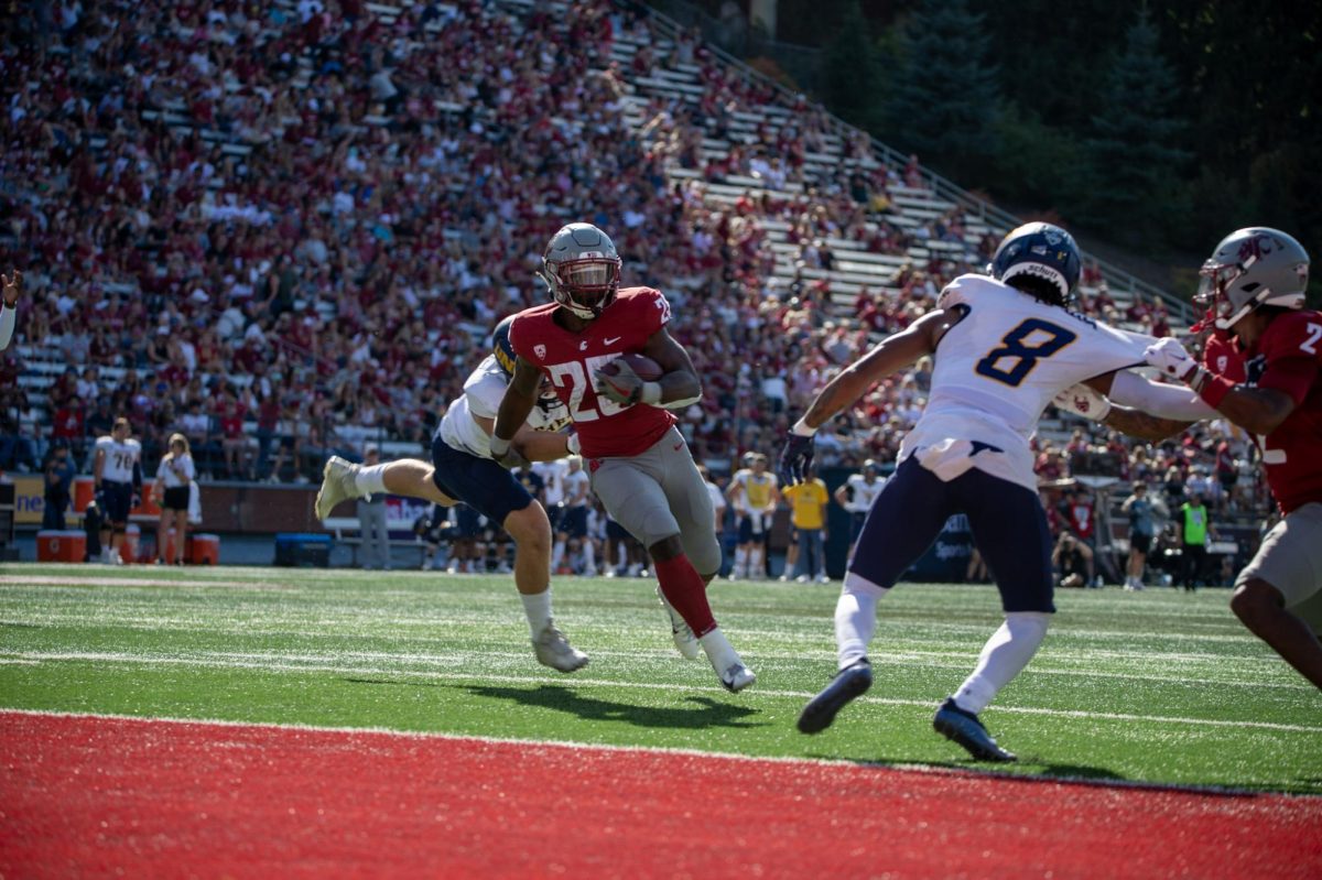 Nakia Watson pushes for the end zone against Northern Colorado, Sept. 16. 