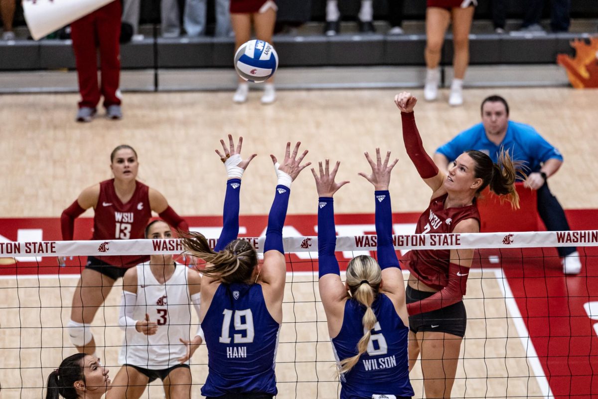 WSU+outside+hitter+Pia+Timmer+spikes+the+ball+during+an+NCAA+volleyball+match+against+UW%2C+Sept.+21%2C+2023%2C+in+Pullman%2C+Wash.