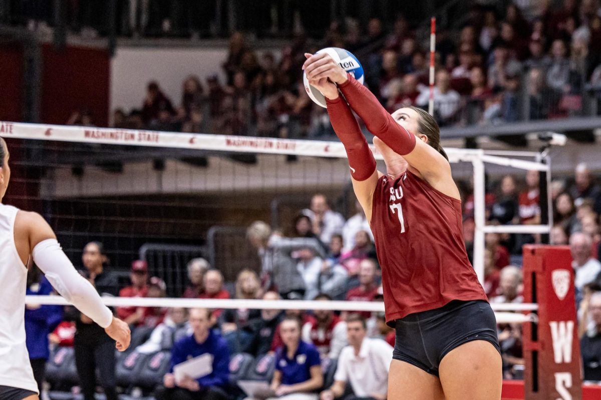WSU outside hitter Pia Timmer digs the ball during an NCAA volleyball match against UW, Sept. 21, 2023, in Pullman, Wash.