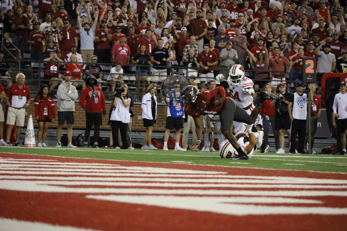 Cam Ward falls toward the end zone trying to score on a scramble, Sept. 9. 