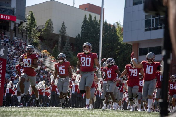 WSU run on the field before taking on Northern Colorado, Sept. 16. 