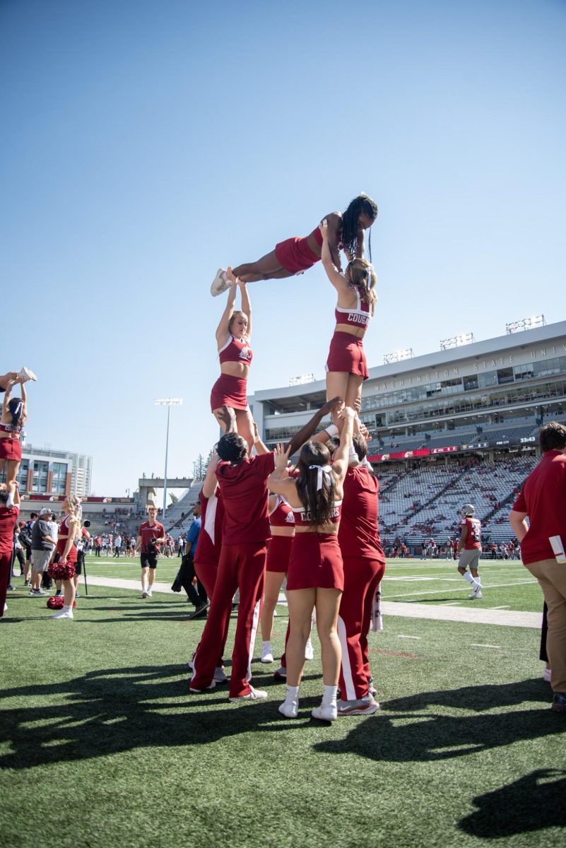 The WSU cheer team shows off their skills before the Cougs take on Northern Colorado, Sept. 16. 