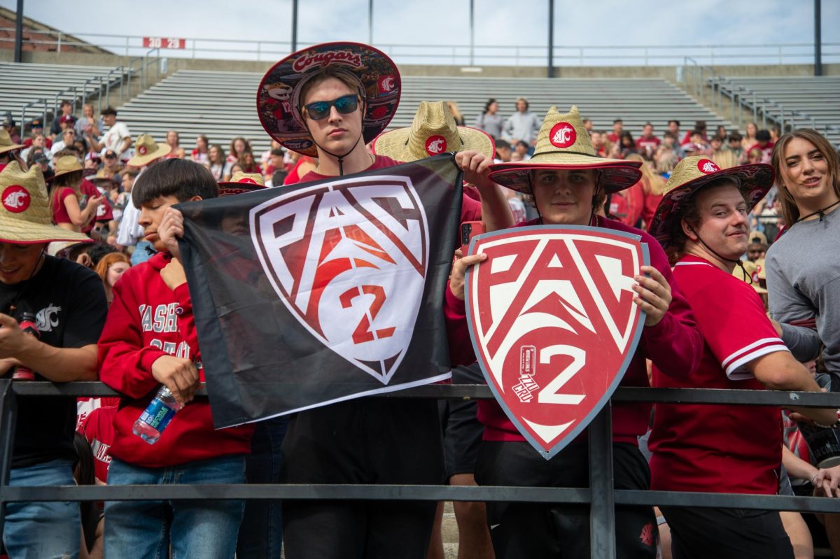 Pac-2+signs+riddled+the+student+section+as+the+two+teams+left+in+the+Conference+playing+the+inagural+Pac-2+Championship.+Sept.+23.+