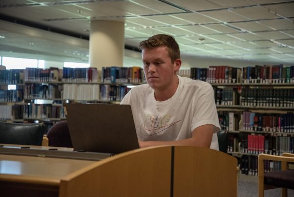 Owen, an incoming transfer sport management major, studying at the Terrell Library, Sept. 6.