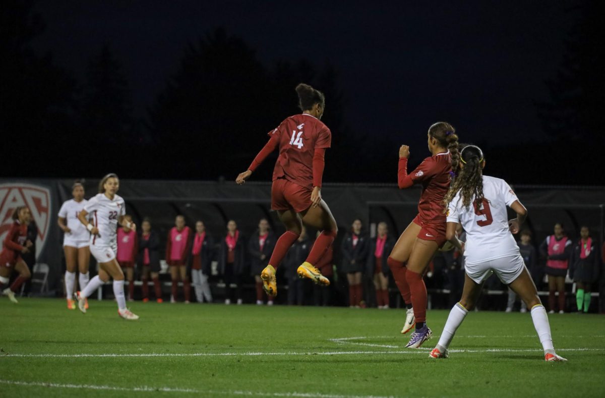 WSU number 14, forward Margie Detrizo, prepares herself for head to ball contact at an NCAA women's soccer game against USC, Sept. 28, 2023, in Pullman, Wash.