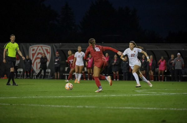 WSU number 16, forward Naomi Clark, rushes the ball against USC number 22 Helena Sampaio at an NCAA womens soccer game against USC, Sept. 28, 2023, in Pullman, Wash.