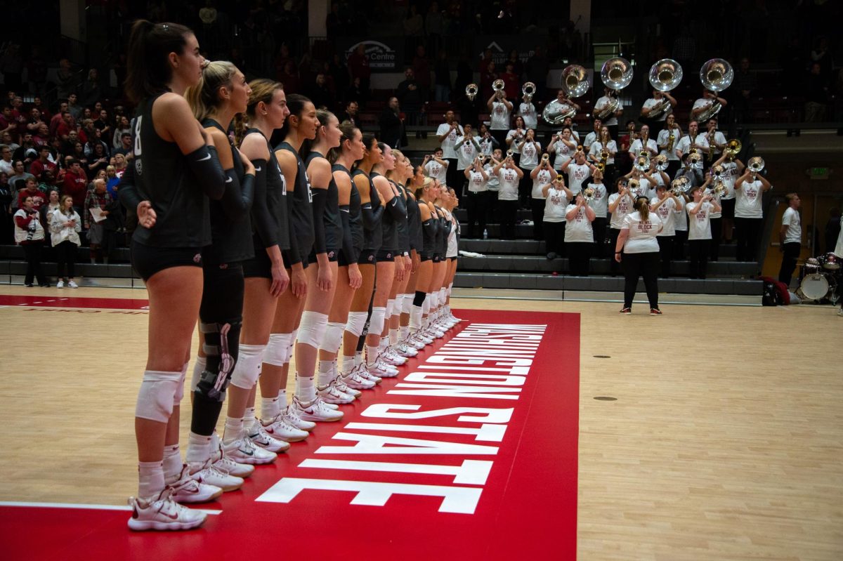 The 2023 WSU volleyball team during the national anthem before an NCAA volleyball match against the Oregon Ducks, Oct. 27, in Pullman, Wash. 