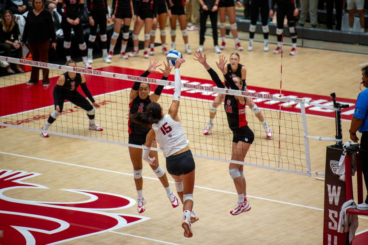 Magda Jehlárová looks to get the ball past two Utah defenders, Oct. 13, in Pullman, Wash. 