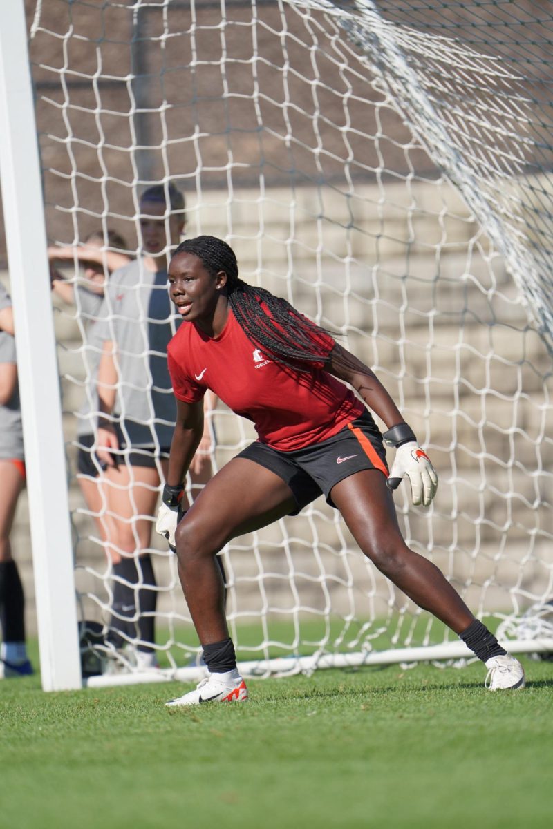 Liya Brooks defends the goal in a WSU soccer practice.