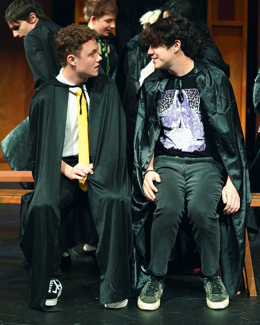 Pullman High School Drama Club members acting during a performance of Puffs! Or Seven Increasingly Eventful Years At A Certain School of Magic and Magic.
