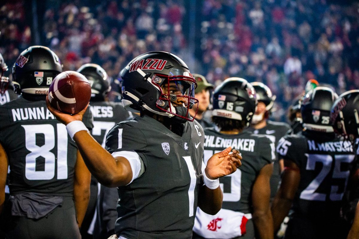 Cam Ward warming up on the sideline during a media timeout, Nov. 17, in Pullman, Wash. 