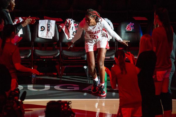 Bella Murekatete dances as she is introduced as the final starter for the womens season opener, Nov. 6, in Pullman, Wash.  