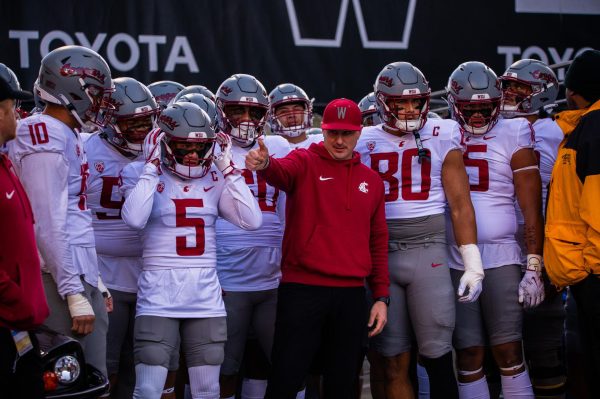 Jake Dickert and the 2023 WSU football team getting ready to take the field at Husky Stadium, Nov. 25, in Seattle, Wash. 