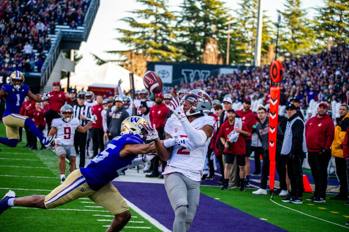 Cam Ward serves up Kyle Williams a beautiful ball at the end of the second quarter to make it 14-14, Nov. 25, in Seattle, Wash. 