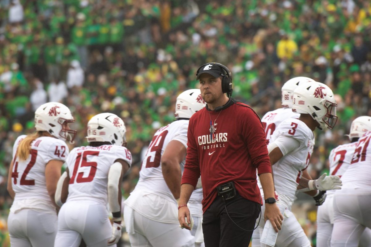 Offensive coordinator Ben Arbuckle stands on the sideline during WSU football's 38-24 loss to Oregon. Oct. 21. 2023 at Autzen Stadium in Eugene, Oregon. 