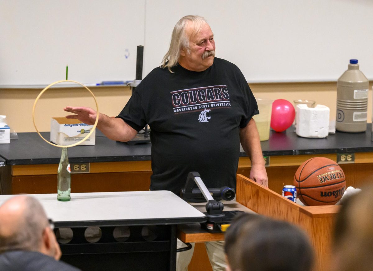 Tom Johnson gives his last principles of physics demonstration, Tuesday, Oct. 31, 2023, at Webster Hall in Pullman, Wash
