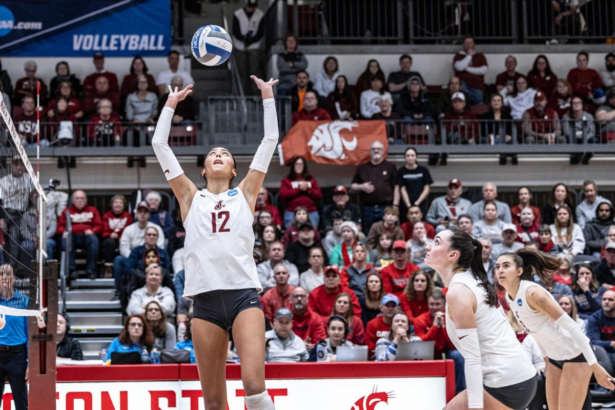 WSU+setter+Argentina+Ung+sets+the+ball+during+an+NCAA+second-round+match+against+Dayton%2C+Dec.+2%2C+2023%2C+in+Pullman%2C+Wash.