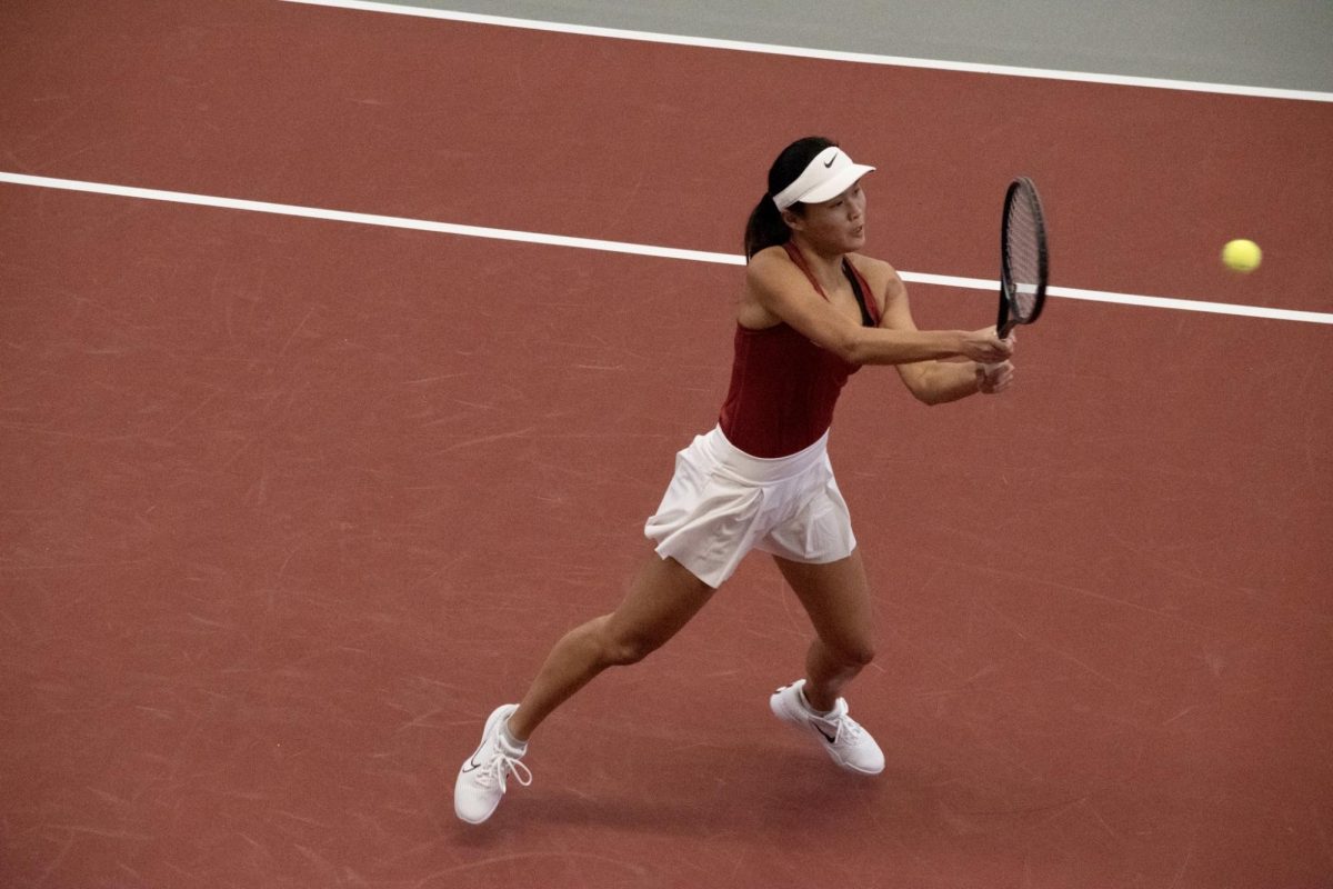 Elyse Tse hits the ball back to her opponent during a match against Idaho, Jan. 21, in Pullman, Wash. 