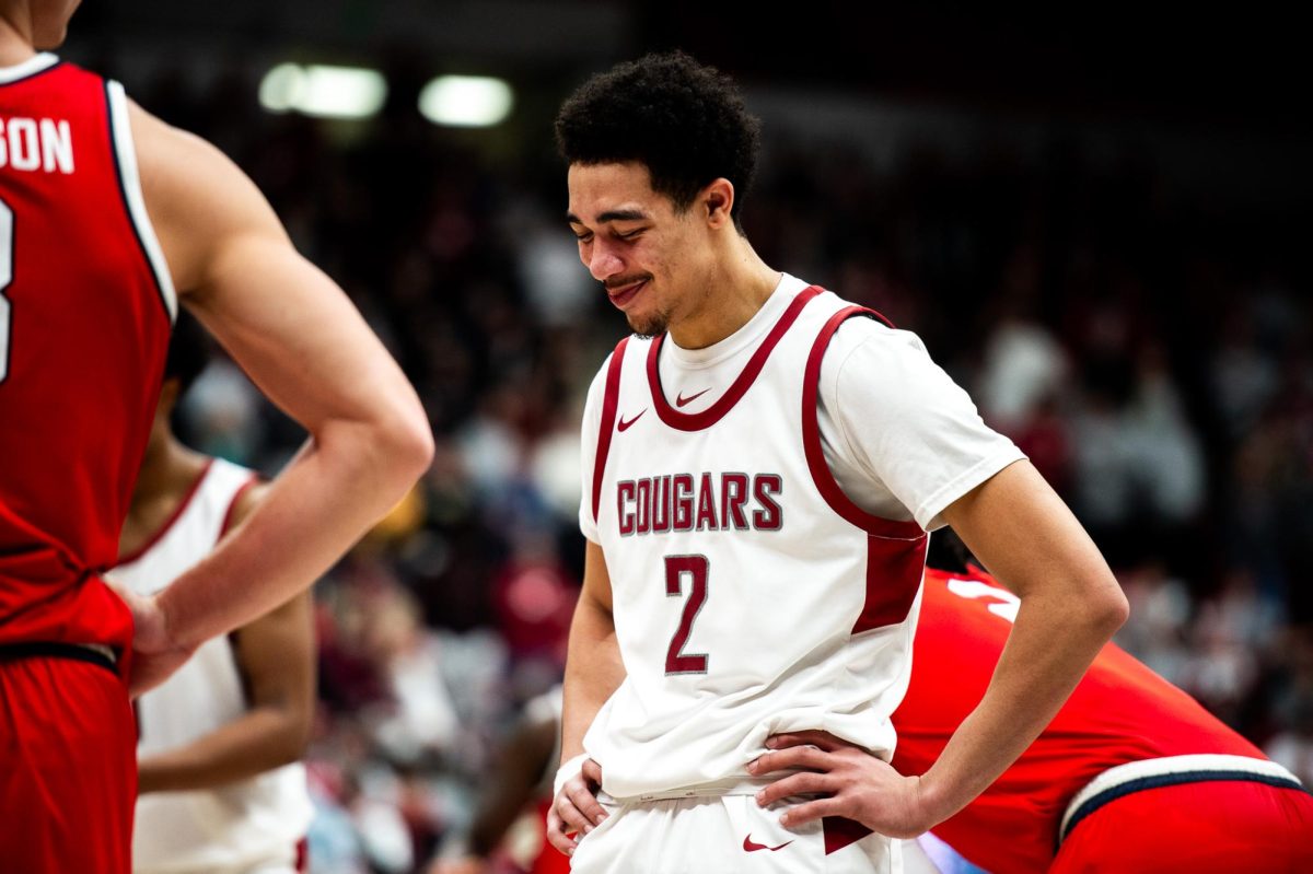 Myles+Rice+smiles+to+himself+during+the+Cougs+big+win+against+Arizona%2C+Jan.+13%2C+2024%2C+in+Pullman%2C+Wash.+