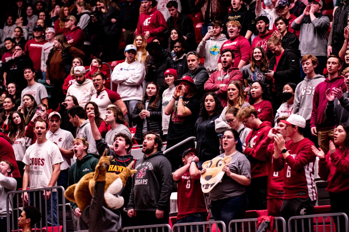Butch leads WSU students in the GO COUGS chant during WSU mens basketballs 78-69 win over Colorado, Jan. 27 in Pullman, Wash. 